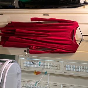 Red long sleeved mid calf dress sized 10.  Never worn.